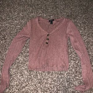 Pink rose gold crop top.